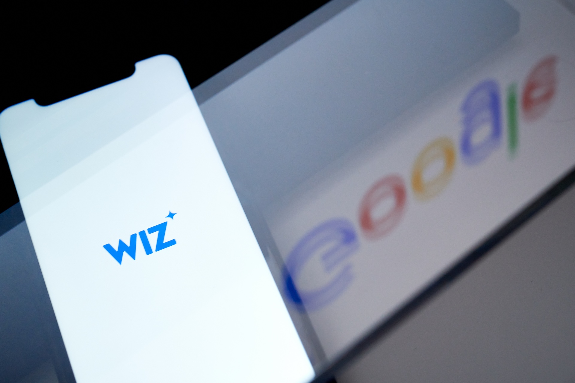 Logo​ de Wiz sur un smartphone